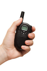 Hand holding walkie-talkie radio