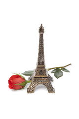Fototapeta na wymiar Eiffel tower souvenir with a red rose