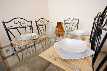 Large dining table and chairs in a house