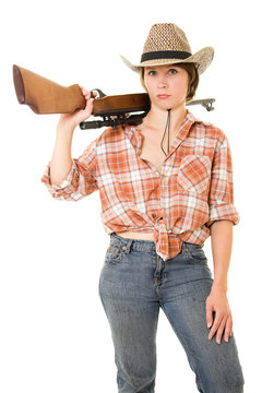 Cowboy woman with a gun on a white background.