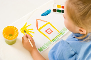 Girl with paint on a white background.