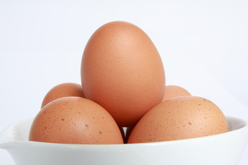 Eggs is on disk for cooking.