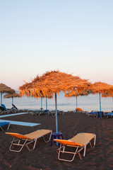 Sunbeds in Perissa, Santorini, Greece