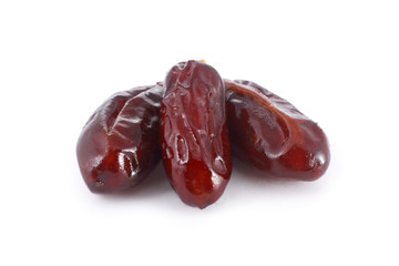 Three dates isolated on white