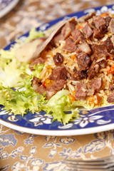 Uzbek national dish - plov with horse meat