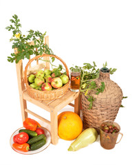 Vegetables, fruit, bottle on a floor