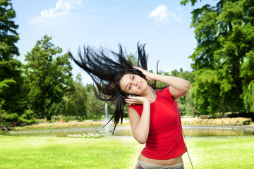 woman playing and listening music