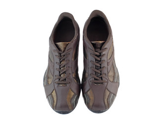 Pair of leather brown sneakers. Isolated