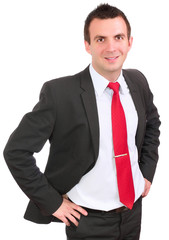 Portrait of cheerful businessman in black suite.