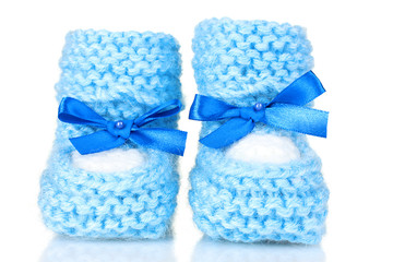 pink baby booties blue isolated on white