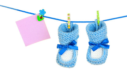 baby socks and booties isolated on white