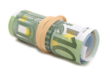 Group of Euro bills rolled up with elastic around