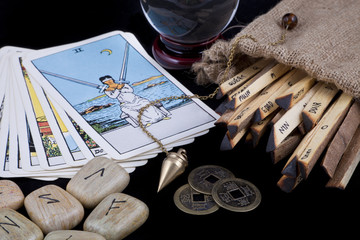 Various fortune telling techniques on a black background
