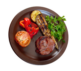 Grilled beef on white plate  with vegetable.