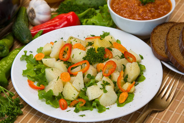 Boiled potatoes with vegetables