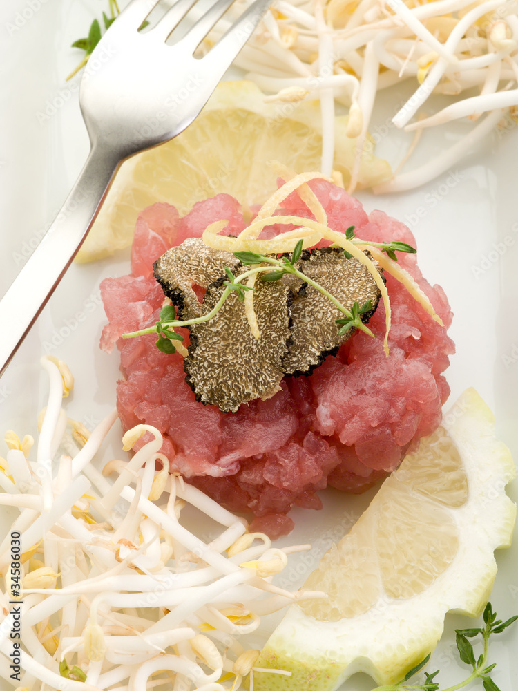 Poster tuna tartar with truffle and soy sprouts