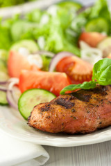 Grilled chicken breast with vegetables