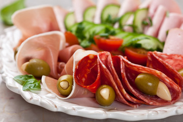 Mixed cold cuts with garlic stuffed olives