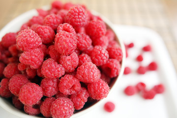 plate full of rasberries