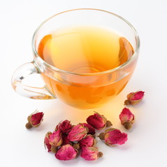 Cup of tea and tea roses.