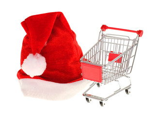 Weihnachtseinkauf / Nikolausmütze mit Einkaufswagen