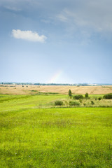 Fototapeta premium Countryside landscape with rainbow