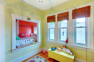 Children yellow bedroom with sleeping area