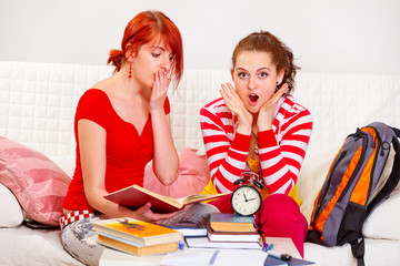 Two studying girlfriends shocked because running out of time