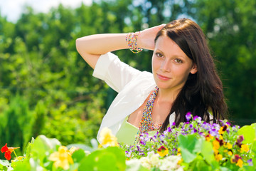 Naklejka na ściany i meble Summer garden flower beautiful woman romantic look