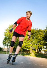 Fototapeta premium Young active roller blade skater