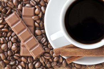 Coffee beans with cinnamon sticks