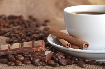 Coffee beans with cinnamon sticks