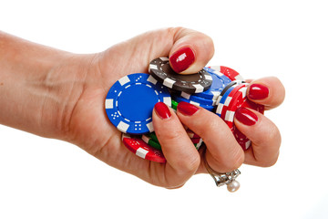 Hand holding poker chips