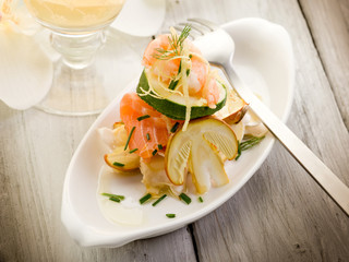 salad with shrimp salmone carpaccio and slice ovum mushroom