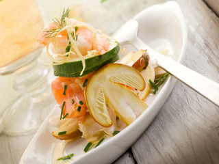 salad with shrimp salmone carpaccio and slice ovum mushroom