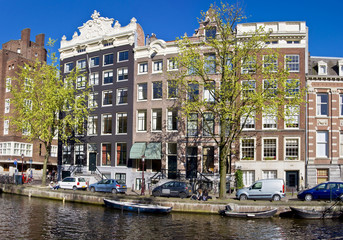 Fototapeta premium Amsterdam Life. Residential homes on the canal.