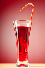 Colourful cocktail in glasses with ice