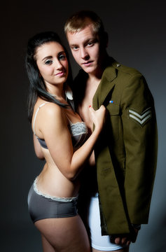 Young couple man in army jacket
