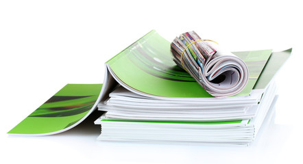 many magazines isolated on white