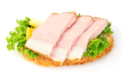 tasty sandwich with vegetables and ham isolated on white
