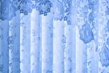 Blue lace curtain with valance