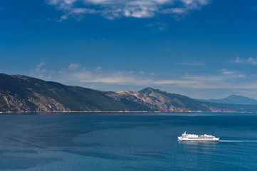 Fototapeta na wymiar White ferry boat in Adriatic sea, near Croatian coast
