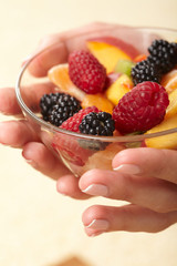 fruit salad in the hands