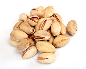 Close-up image of pistachios studio isolated on white background