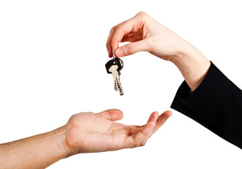 Hand of businessman passing a set of keys to another hand