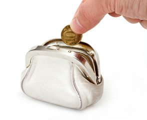 Open white purse with hand