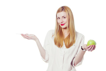 woman doctor with apple and syringe