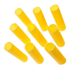 Italian cannelloni pasta tubes isolated over white background.