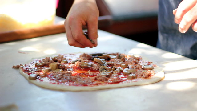 Preparing Pizza At Outdoor Market