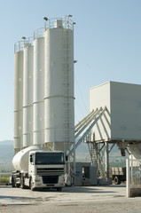 Cement factory and a truck loading cement